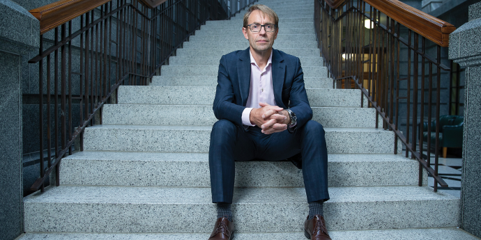 Ashley Bloomfield sitting on steps 